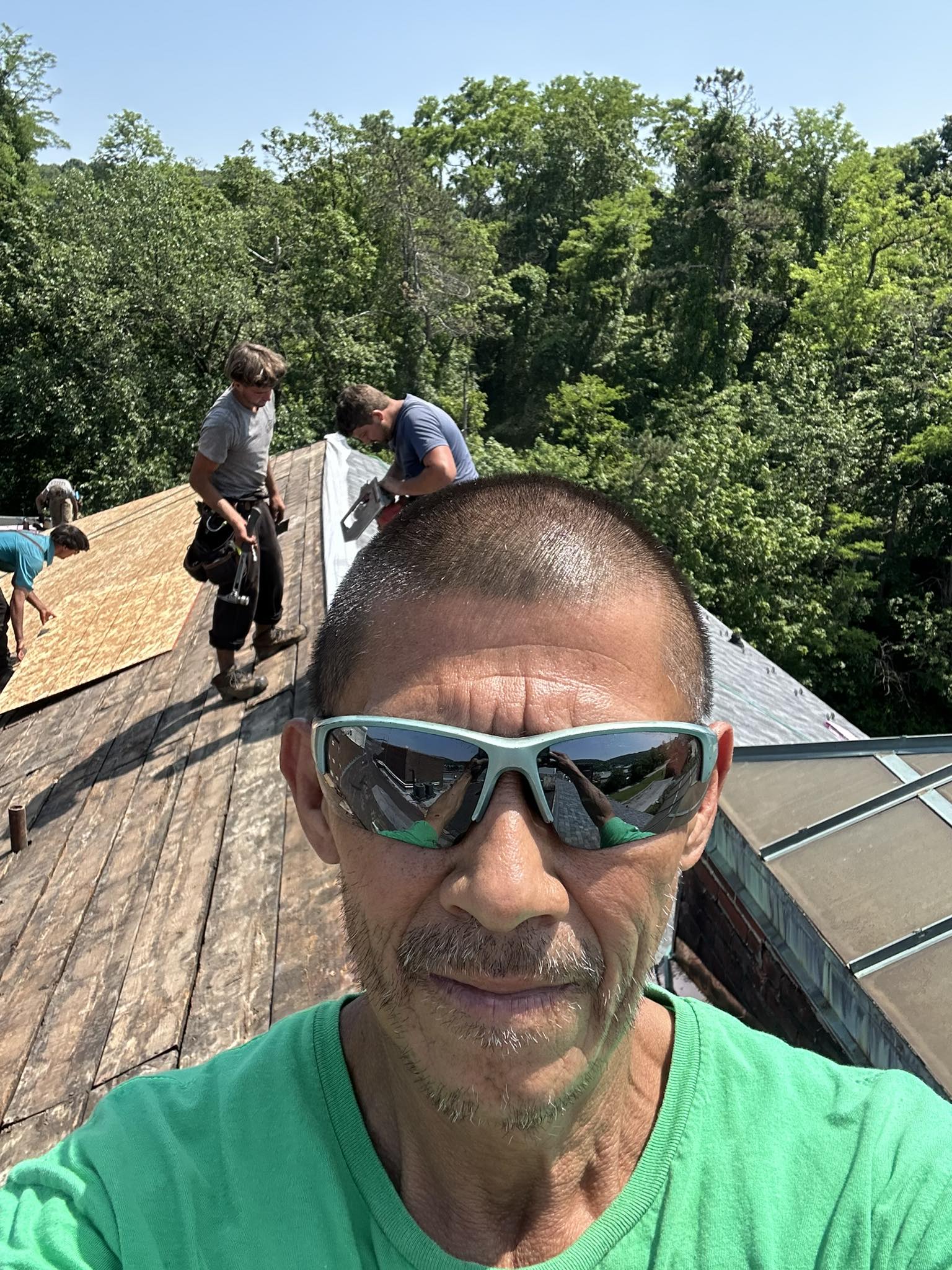 Pulgarin Roofing team working on a project